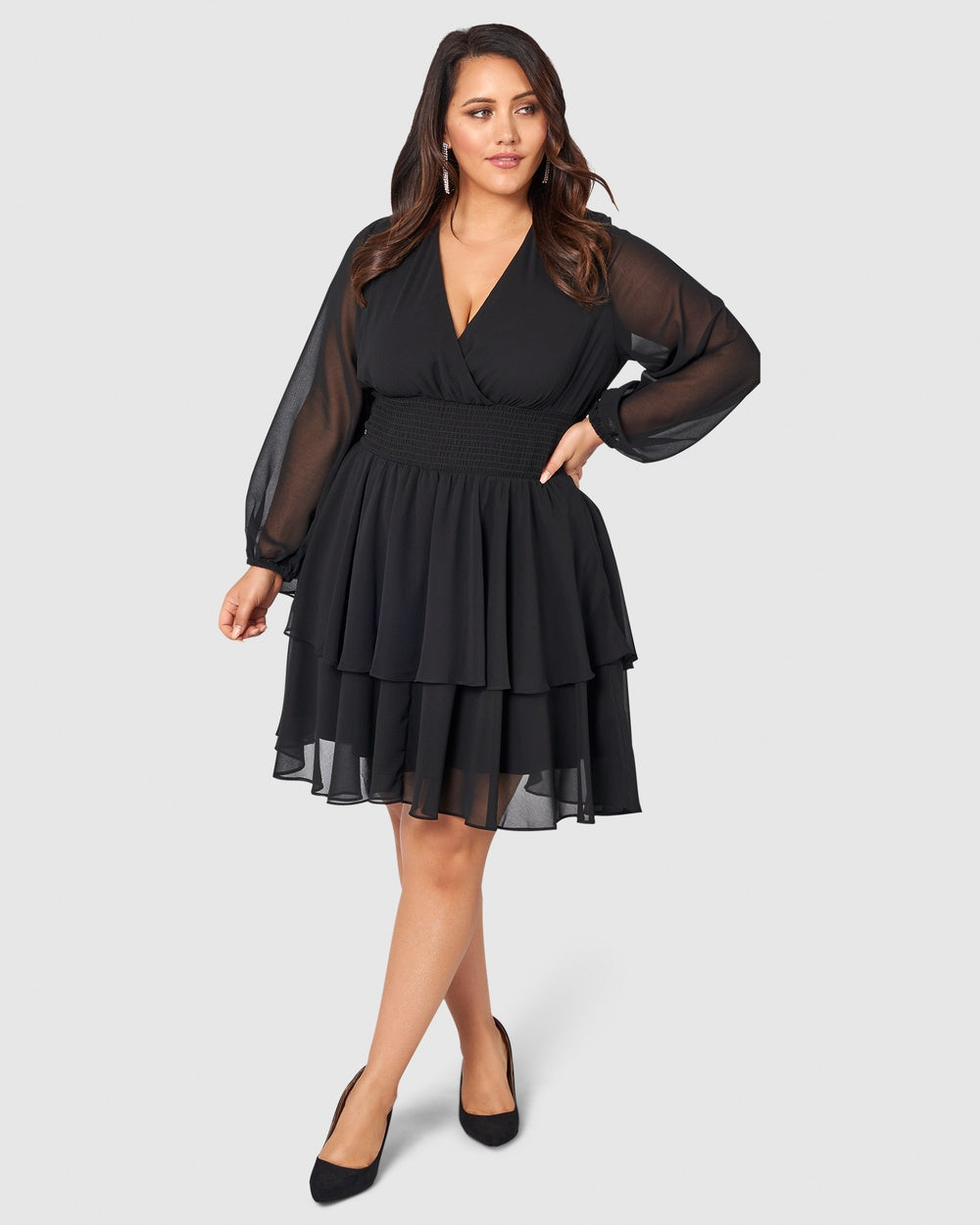 A little black dress with a flattering v-neckline and a fit and flare silhouette.