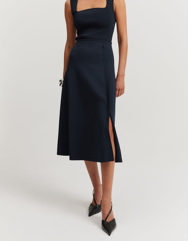 A-Line Skirt that you can dress up or down. Tonal pairing with either the blue pullover or navy shirt.