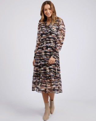 Abstract Print Dress. This can be dressed up or down depending on the occa12sion. Pair with a denim jacket and black boots for a night out.