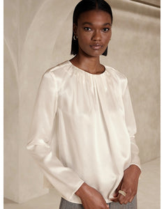 An alternate silk shirt in a gathered neck style.
