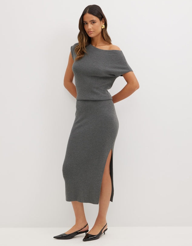 A lovely knit dress that can be layered under a blazer for a sharp work look. Then switch out the shoes for a heel and pull the knit off one shoulder for a sexier night time look